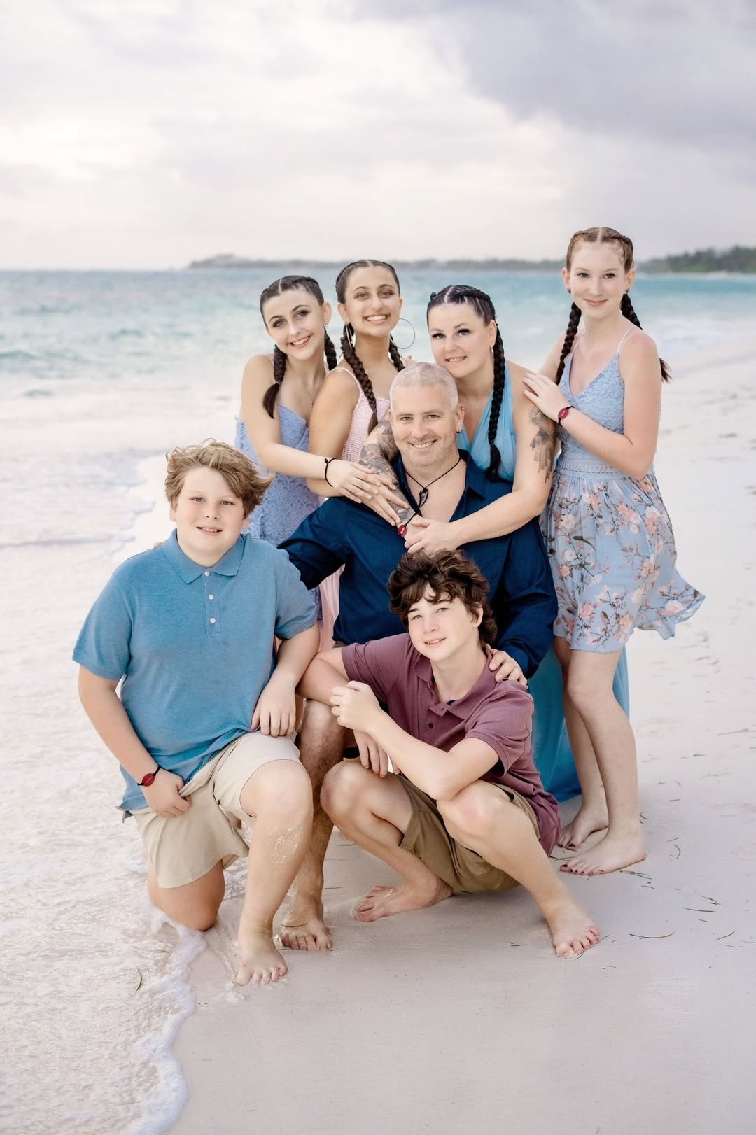 Ryan Green with his family on the beach